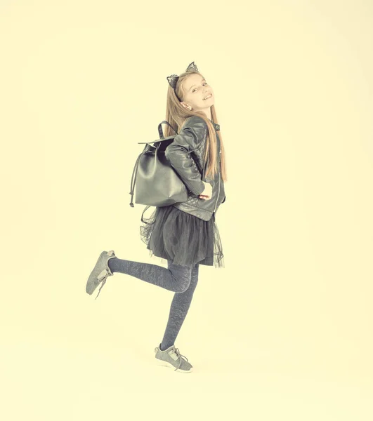 Fashionable teenage girl in a black jacket — Stock Photo, Image