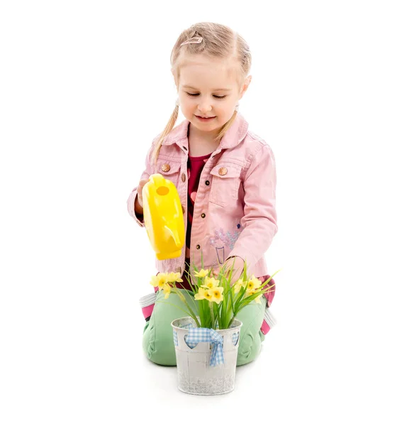 Kid watering flowers, isolated on white background — Stock Photo, Image