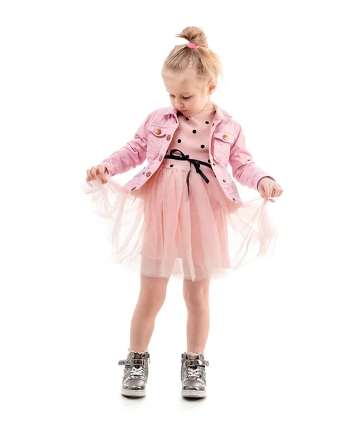 Cute girl holding her skirt, ready to dance — Stock Photo, Image