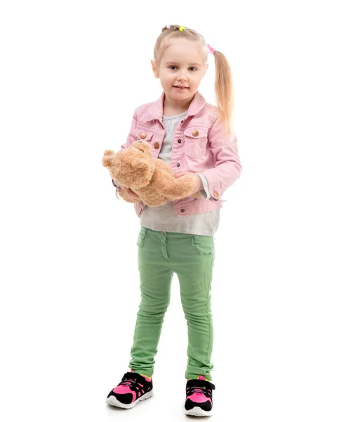 Menina com brinquedo, isolado no fundo branco — Fotografia de Stock