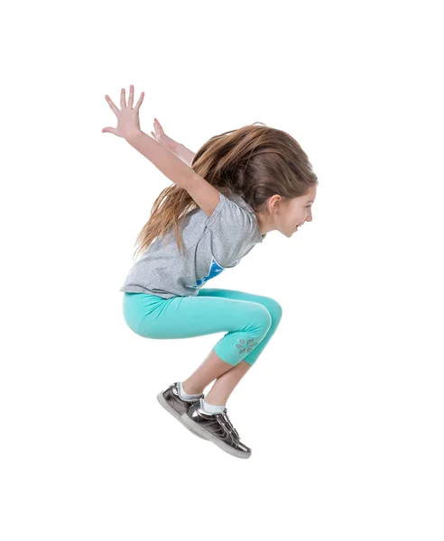 Menina ativa de cabelos longos dançando, isolado — Fotografia de Stock