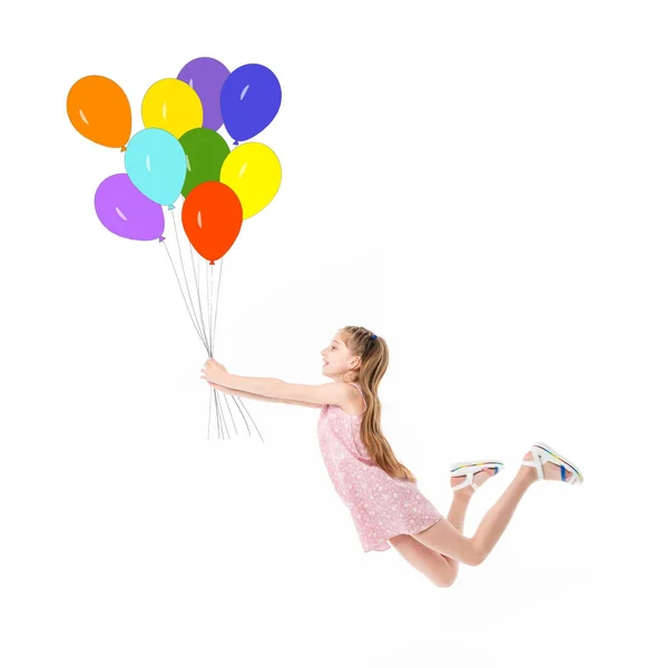 Adolescente en rosa vestido volando en globos —  Fotos de Stock