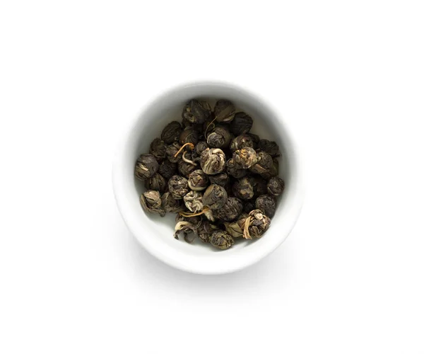 Té de jazmín verde en tazón blanco, vista superior — Foto de Stock