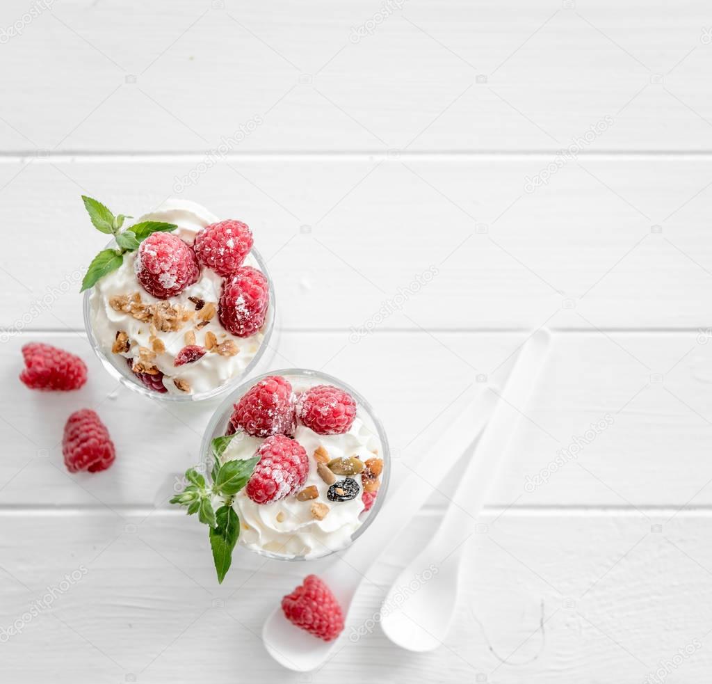 Granola with yoghurt and raspberry
