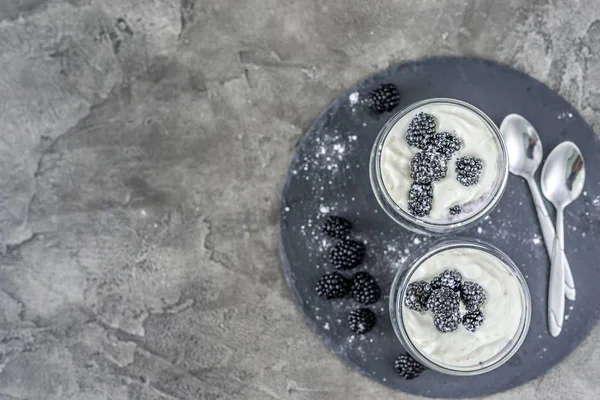 Dessert from yogurt with blackberries — Stock Photo, Image