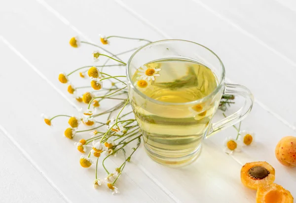 Chamomile tea with apricots — Stock Photo, Image