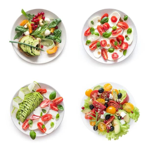 Vegetarische Salate auf weißem Hintergrund — Stockfoto