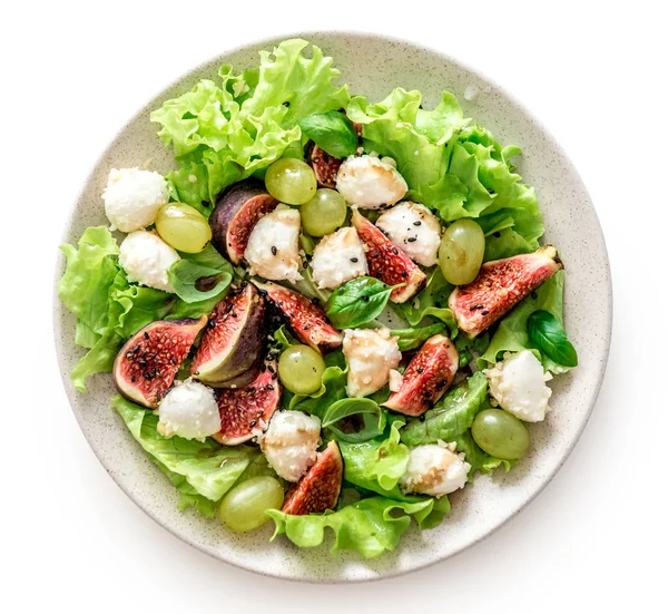 Salat mit Feigen, Mozzarella und Trauben auf weißem Holzgrund. — Stockfoto