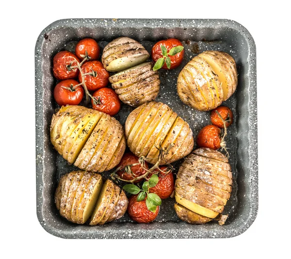 Baked potatoes in baking form with vegetables isolated on white background. — Stock Photo, Image