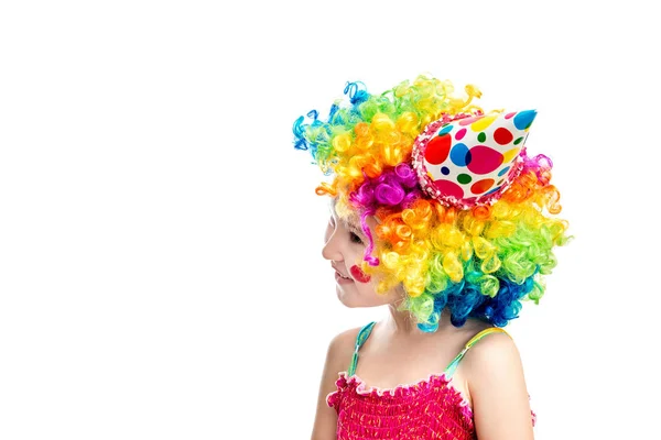 Lilla leende flicka klädd som en clown — Stockfoto