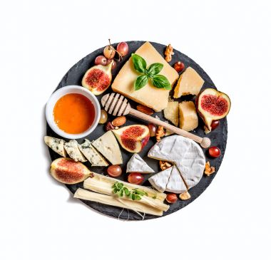 Cheese plate served with nuts and honey clipart