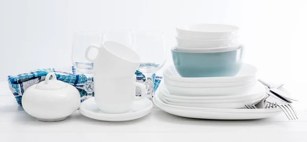 White square dinnerware set with glasses — Stock Photo, Image