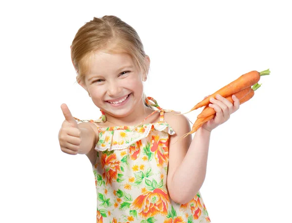 Bambina con la carota — Foto Stock