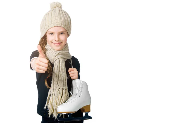 Schattig klein meisje met figuur schaatsen — Stockfoto