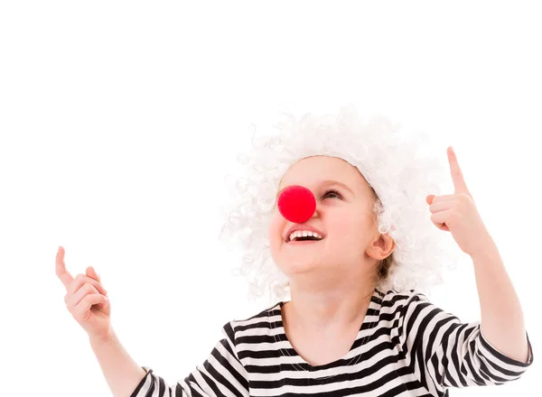 Chica sonriente en peluca blanca y apuntando hacia arriba — Foto de Stock