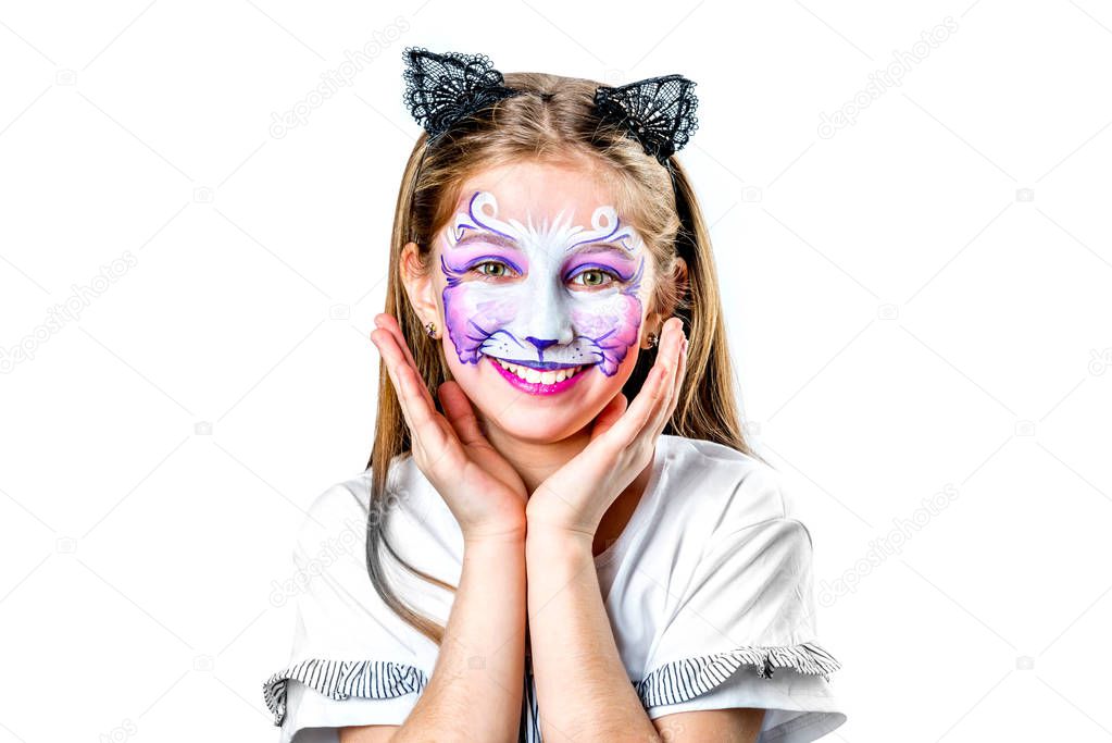 Portrait of teen girl with cat face painting