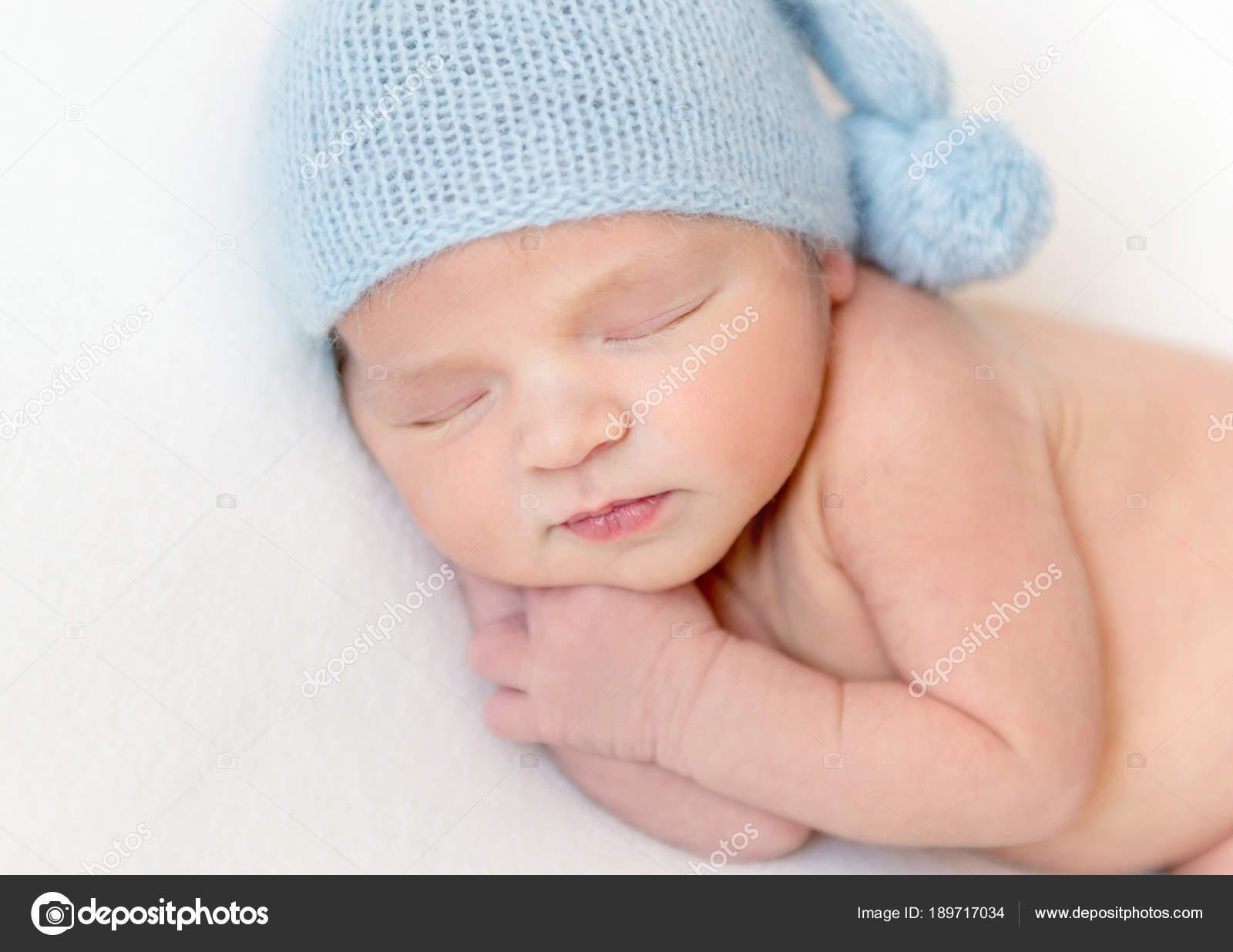 hat on newborn while sleeping