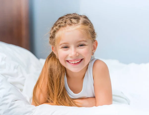 Smiling little girl woke up — Stock Photo, Image