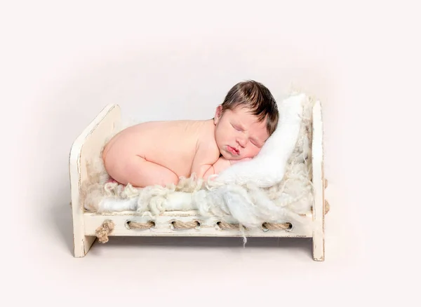 Adorable newborn baby sleeping on his stomach — Stock Photo, Image