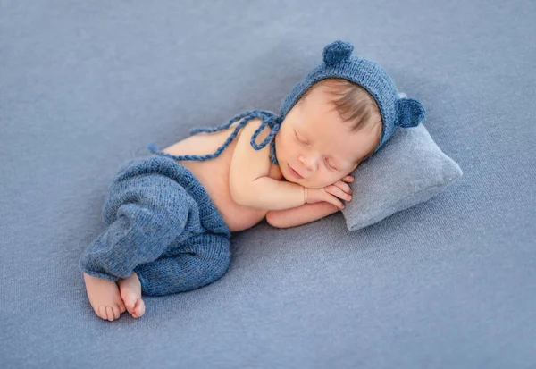 Charming newborn in cute hat — Stock Photo, Image