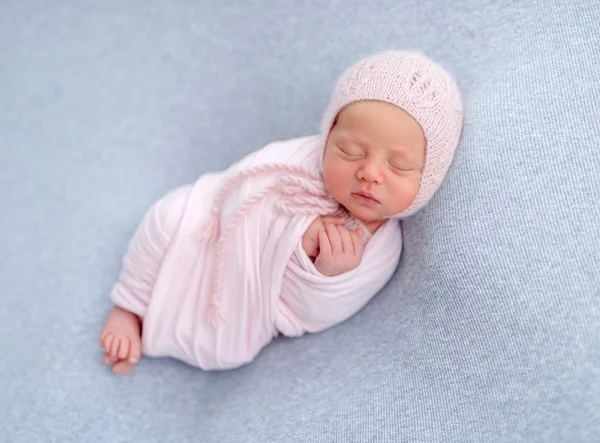 Charming wrapped up newborn — 图库照片