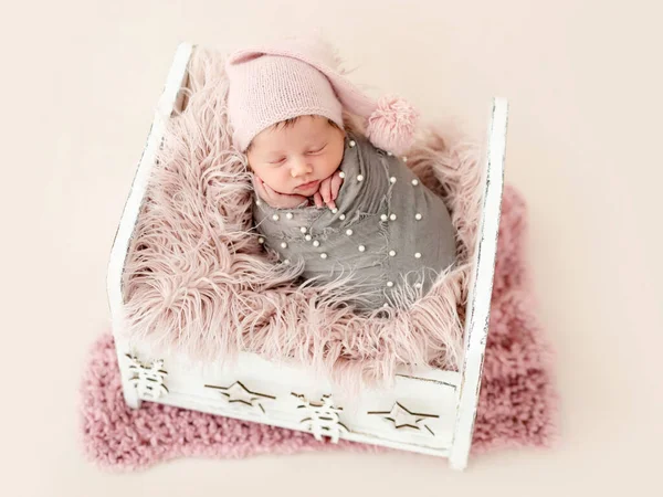 Newborn in cradle — Stock Photo, Image