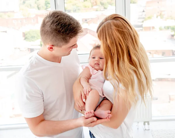 Couple with baby — Stock Photo, Image