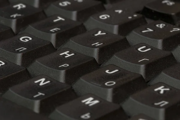 Primer plano del teclado negro. Patrón de teclado. Patrón horizontal. Patrón vertical . — Foto de Stock