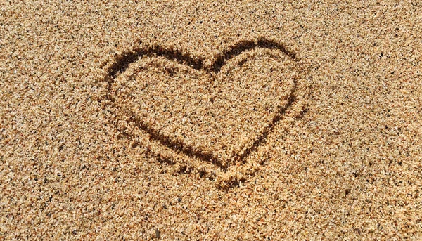 Abstract heart drawing in sand — Stock Photo, Image