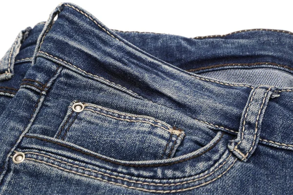 Fragment of dark blue jeans on white background — Stock Photo, Image