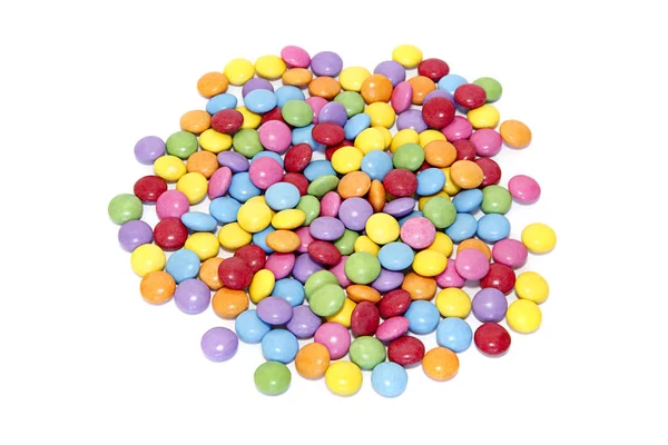 Bonbons colorés lumineux sur fond blanc — Photo