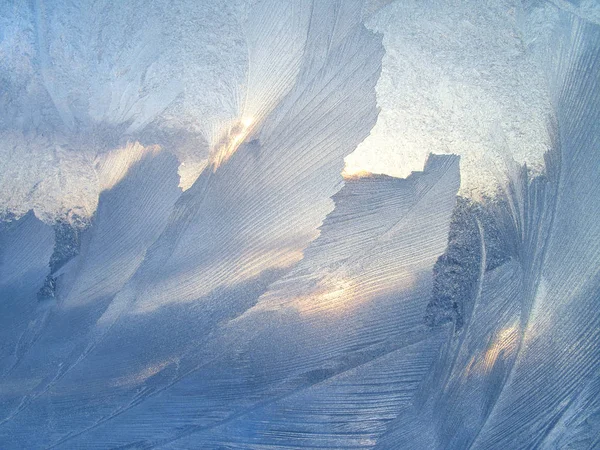Hermoso patrón de hielo y luz solar —  Fotos de Stock
