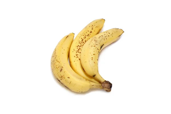 Bananes jaunes mûres sur fond blanc — Photo