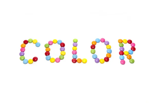 Word ''Color'' made from multicolored sweets candy — Stock Photo, Image