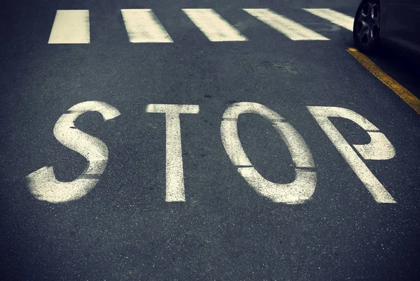 City crosswalk with symbol stop — Stock Photo, Image