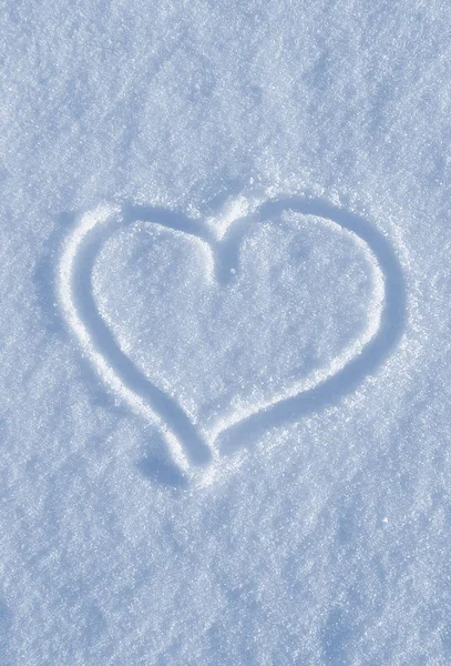 Draw of heart on the white snow — Stock Photo, Image