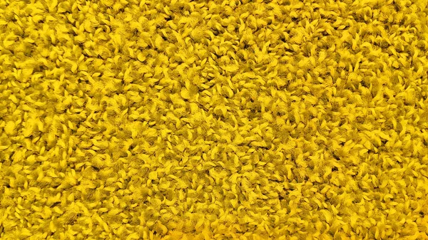 Ярко-желтая текстура ковра — стоковое фото