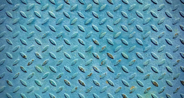 Старая металлическая бриллиантовая пластина, покрытая синей краской — стоковое фото