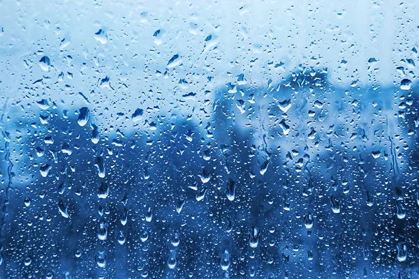 Gocce d'acqua su fondo di vetro — Foto Stock