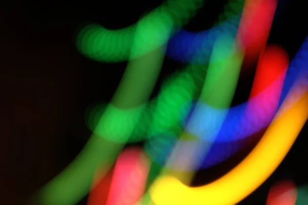 Abstrakt färgglad rörelse bakgrund med suddiga ljus — Stockfoto