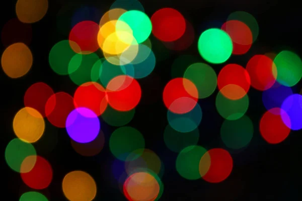 Unfocused colorful lights, holiday background — Stock Photo, Image