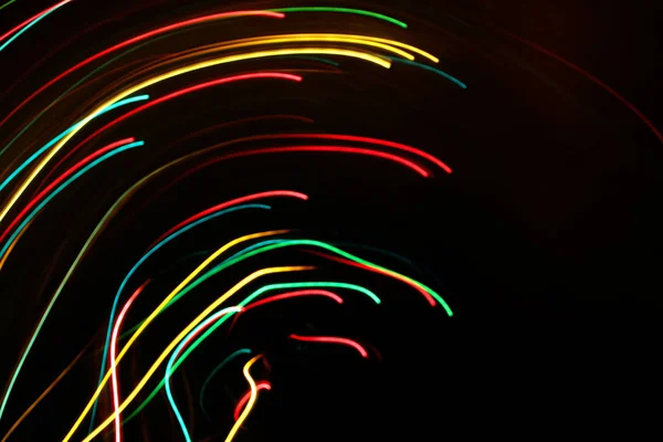 희미 한 빛으로 이루어진 추상적 인 다채 로운 운동 배경 — 스톡 사진