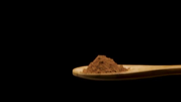 Cuillère en bois avec cannelle moulue 