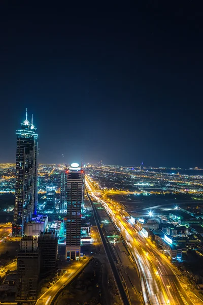 Dubai à noite, Emirados Árabes Unidos — Fotografia de Stock