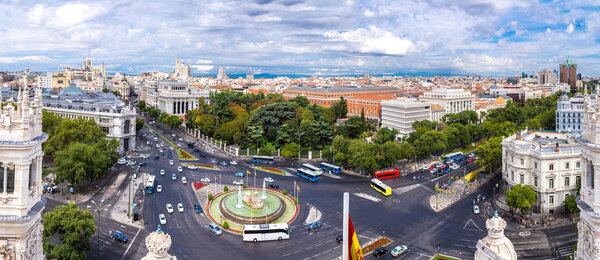 Aerial view of Cibeles fountain at Plaza de Cibeles in Madrid in a beautiful summer day, Spain