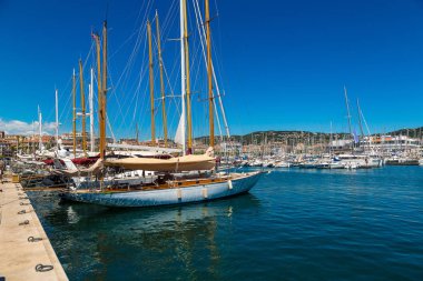 anchored yachts in Cannes port  clipart