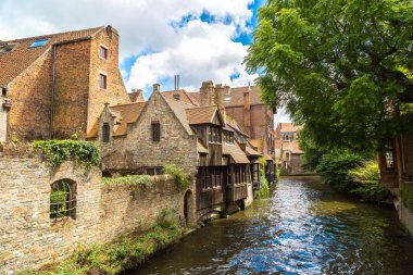 Houses along canal in Bruges clipart
