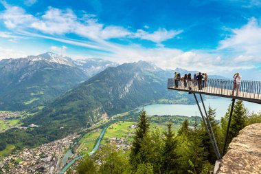 People standing on observation deck clipart