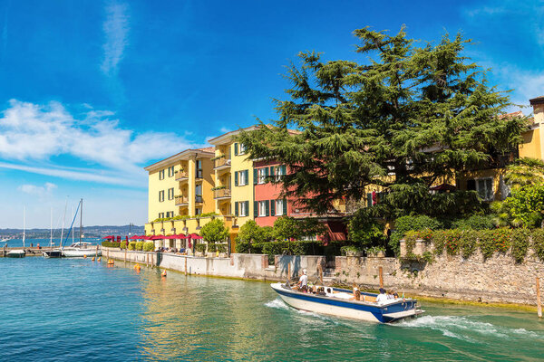 Houses at Sirmione on lake Garda on a beautiful summer day, Italy
