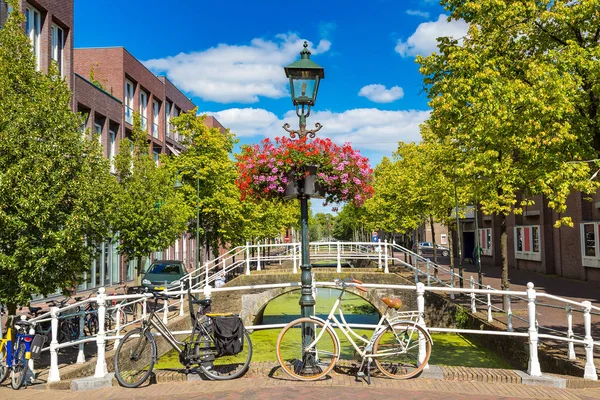 Bicycles on bridge at Canal — Stock Photo, Image